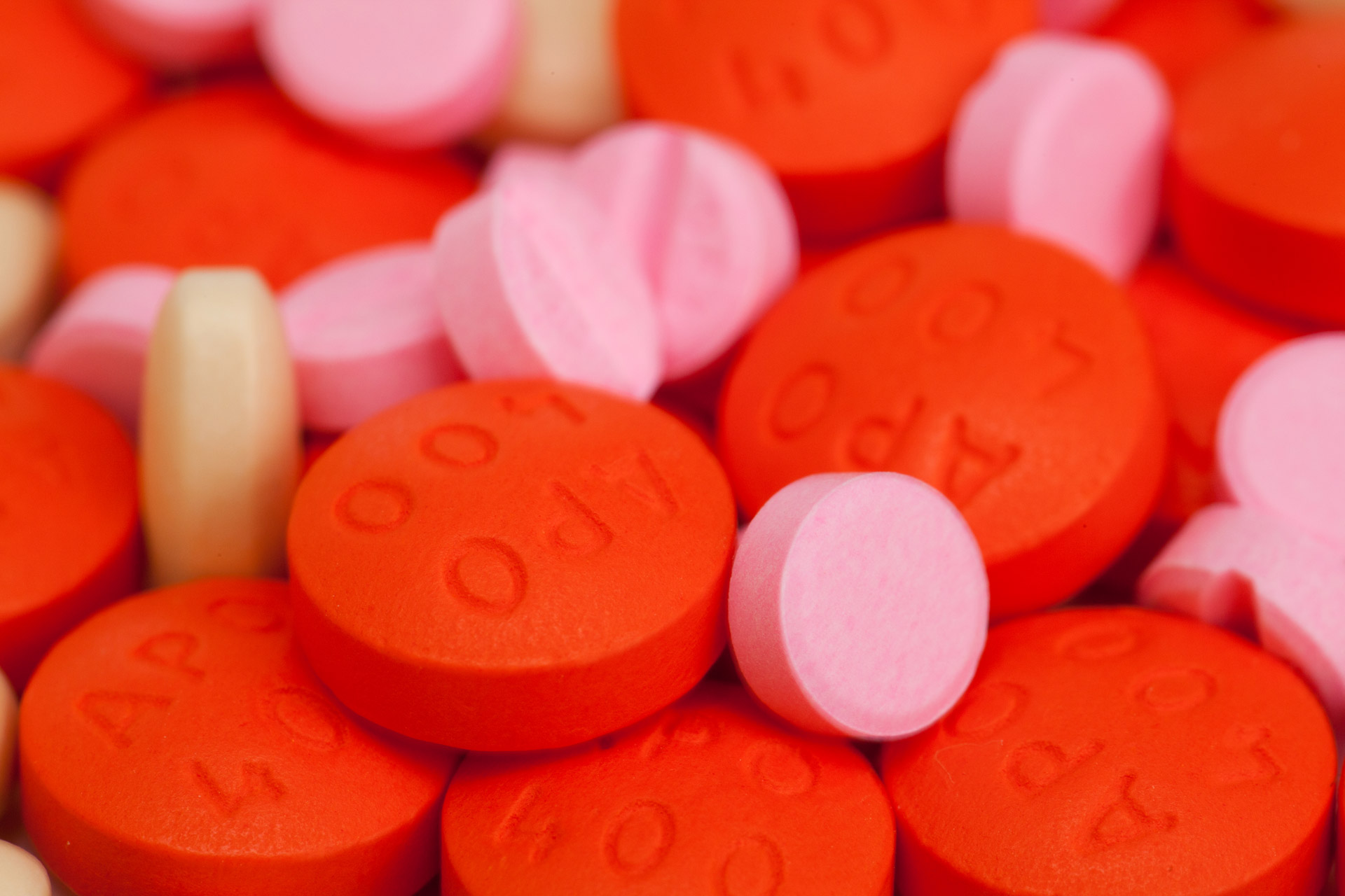 Picture of red and pink pharmaceutical pills